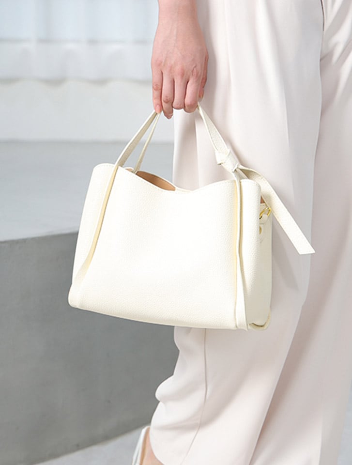 サイドノットデザインフェイクレザーハンドバッグ