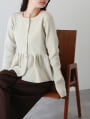 くるみボタンペプラムカーディガン